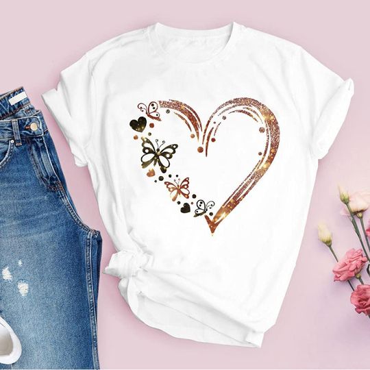 Discover Camiseta Unissexo Manga Curta Formato de Coração Decorado com Borboletas