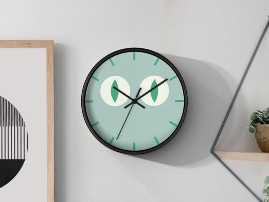 Discover Cat Eyes Wall Clock