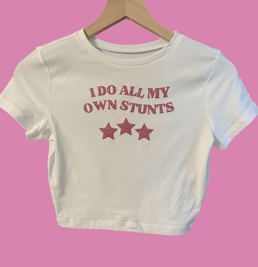 Discover Y2k I Do All My Own Stunts Flowy Cropped Tee