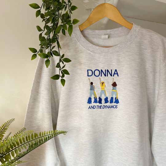 Discover Donna and the Dynamos Embroidered Sweatshirt | Unisex Sweatshirt