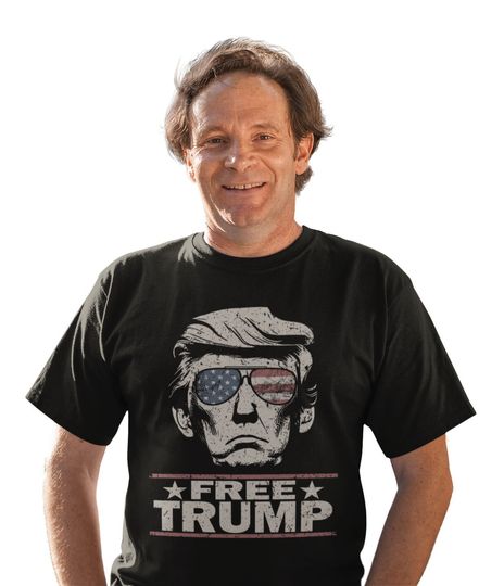 Discover Free Trump 2024 Vintage American Flag Sunglasses Mugshot Unisex Softstyle T-Shirt