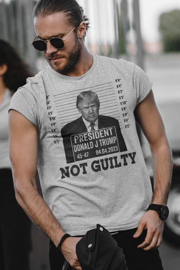 Discover Funny Trump Mugshot Not Guilty T-Shirt - Political Satire