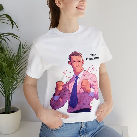 Discover Zuckerberg vs Musk: Team Zuckerberg Battle of the Billionaires Tee