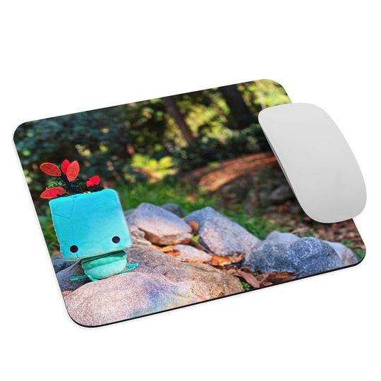 Discover Gris Forest Friend On Rocks Mouse pad