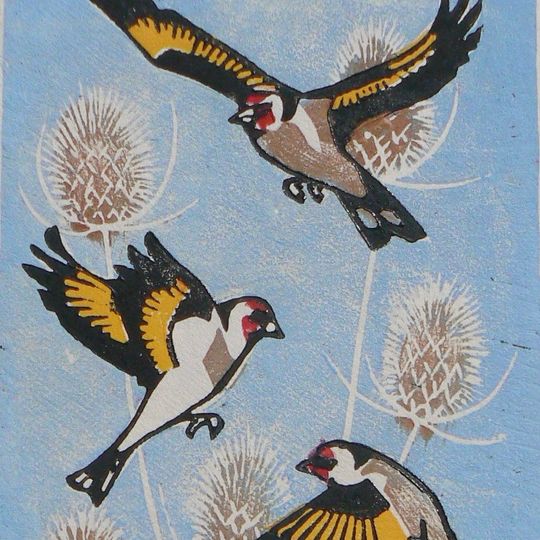 Discover Goldfinches in flight linocut print