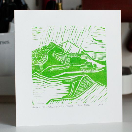 Discover Handmade lino cut print. Landscape design of Great Pen in the East Devon Area of Outstanding Natural Beauty. Printed in pale green.