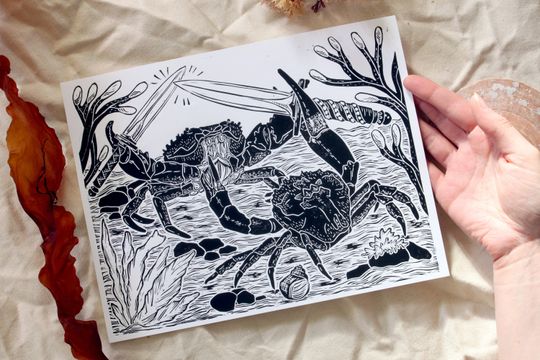 Discover En Garde! - lino-cut/block print depicting two duelling crabs - surf, swim, ocean, beach, printmaking