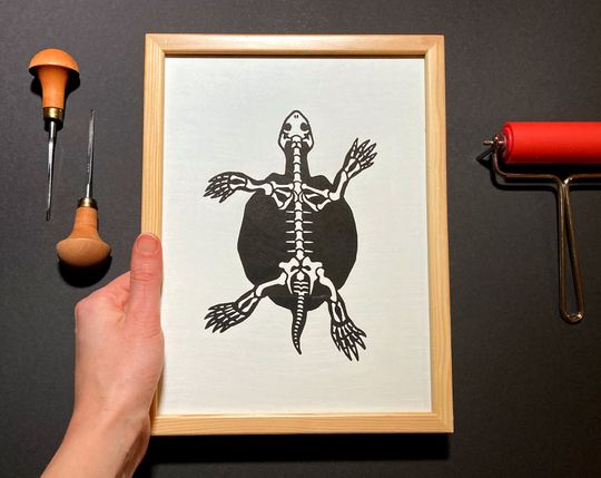 Discover Linocut print turtle | Silhouette with skeleton
