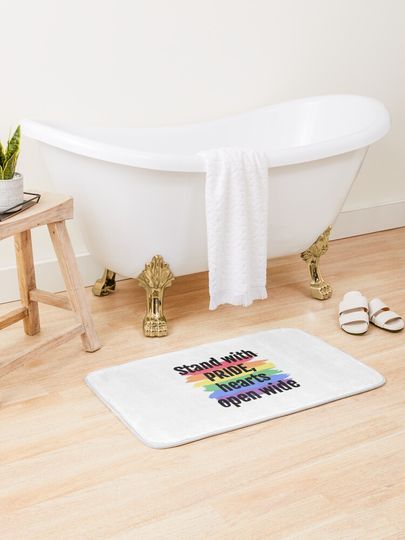 Discover Stand with PRIDE, hearts open wide | Bath Mat