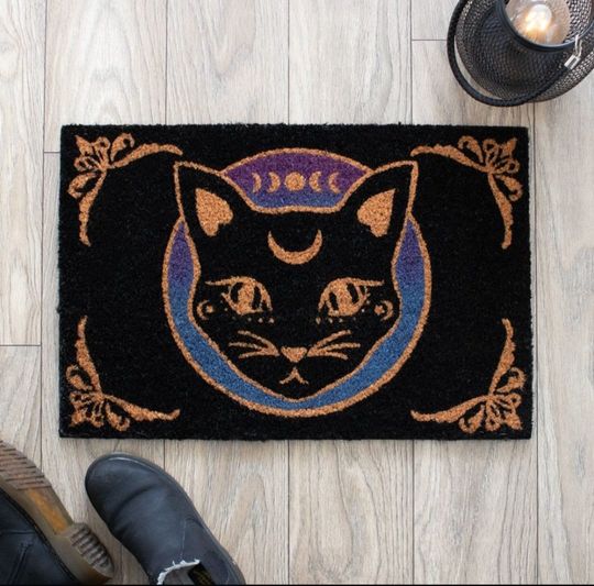 Discover Black mystic mog door mat