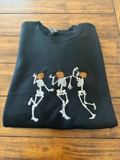 Discover Dancing skeletons embroidered Halloween crew neck sweatshirt.