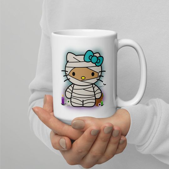Discover Mummy kitty, tan kitty, halloween kitty, White glossy mug
