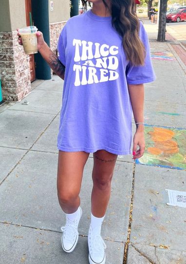Discover Thicc and tired || front graphic tee