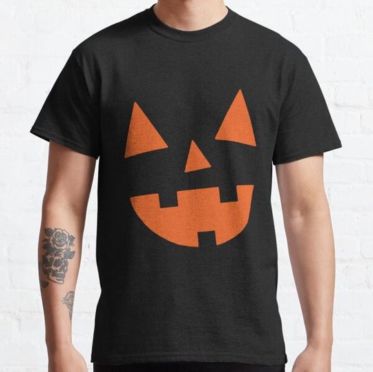 Discover Three tooth Jack o Lantern silhouette ORANGE T-shirts