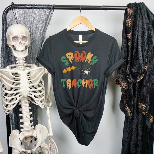 Discover Spooky teacher Halloween shirt, spooky shirt, Halloween t-shirt, funny Halloween, dripping words, fall colors