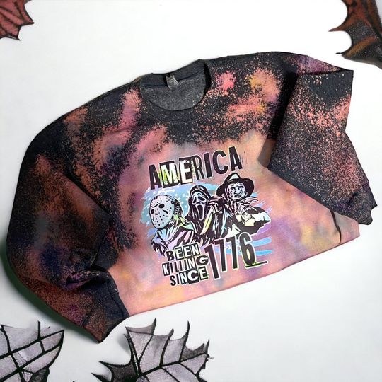 Discover Custom Horror Halloween Pastel Dyed Sweatshirt, Spooky pastel shirt, Halloween character sweater, America 1776 sweatshirt