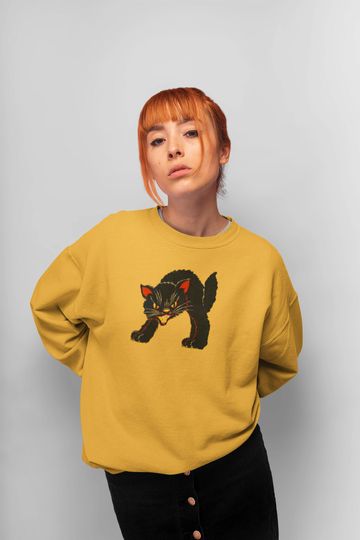 Discover Black Cat Sweatshirt - Vintage 70's 80's 90's inspired graphic sweatshirt. Halloween sweatshirt, unisex, oversized