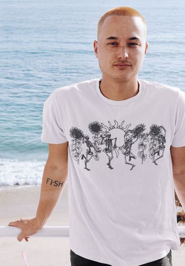 Discover Vintage Dancing Skeletons Graphic Tee