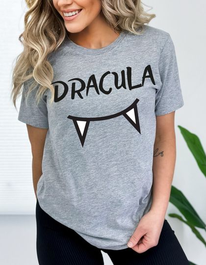 Discover Dracula Fangs Graphic T-shirt, Fun Halloween Scary Shirt, Womans Gift, Dads gift ,Vampire Teeth, Gift for Her, Dracula Fangs Graphic T-shirt