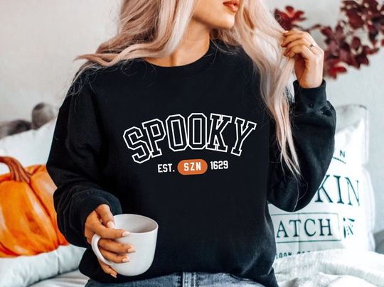 Discover Spooky Season Varsity Crewneck Sweater