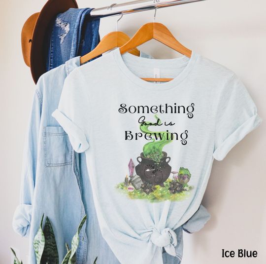 Discover Halloween Pregnancy Announcement Shirt with Witchy Theme