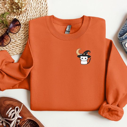 Discover Feline Witchy Sweatshirt, Halloween cat shirt, witch cat long-sleeve shirt, spooky season shirt, witch moon hoodie, cute halloween top