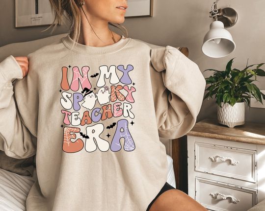 Discover Halloween Teacher Sweatshirt: Trick or Teach