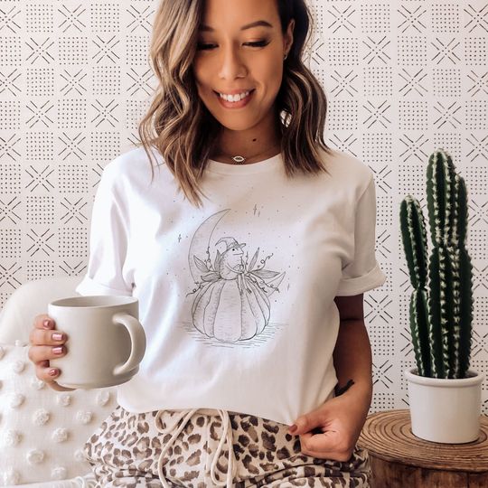 Discover Unisex Witchy Frog T-shirt, Frog Shirt, Pumpkin Shirt, Pumpkin Tee, Witchy Tee, Halloween Shirt, Halloween Gifts, Cottagecore Aesthetic