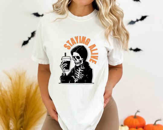 Discover Staying Alive T-Shirt For Halloween, Sarcastic Staying Alive Tee, Funny Skeleton Shirt, Gift For Coffee Lovers, Skeleton Tee