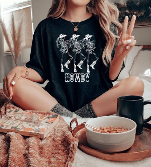 Discover Howdy Dancing Skeleton Graphic Tee - Fun Western Style