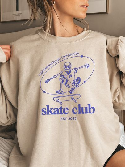Discover Halloweentown Skate Club Sweatshirt | preppy spooky gift halloween sweatshirt skeleton college spooky pastel skateboard shirt skeleton
