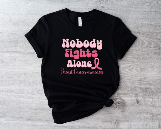 Discover Nobody Fights Alone Shirt, Breast Cancer Awareness T-shirt, Pink Ribbon Team Tee
