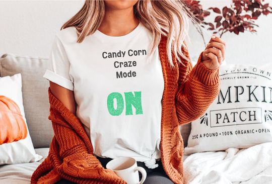 Discover Candy Corn Craze Mode On T-shirt, Halloween t-shirt, shirt for Halloween, Spooky season, trick or treat, BOO, Candy t-shirt