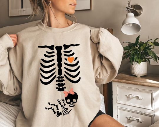 Discover Skeleton Halloween Maternity Sweatshirt, New Baby Girl Pregnancy Announcement Shirt 2023, Pregnant Women Sweater, Mommy to Be Sweater