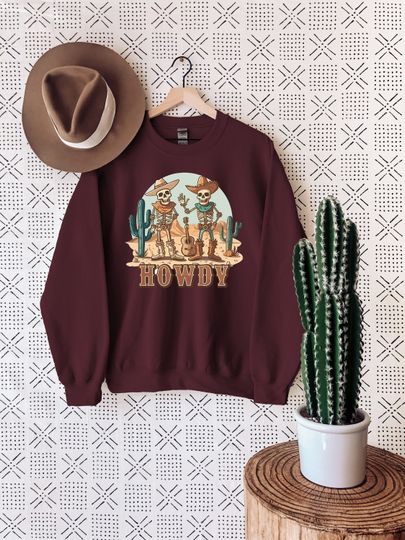 Discover Howdy Skeleton Sweatshirt, Cowboy Skeleton Western Shirt, Country Halloween Shirt, Cowboy Halloween Hoodie