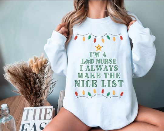 Discover I'm a Labor and Delivery Nurse Nice List Christmas Heavy Blend tshirt, L&D Nursing