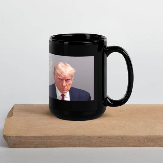 Discover Donald Trump Mugshot - Black Glossy Coffee Mug