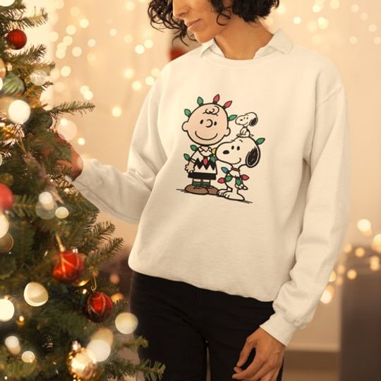 Discover Charlie Brown and Snoopy Wrapped In Christmas Lights Sweater