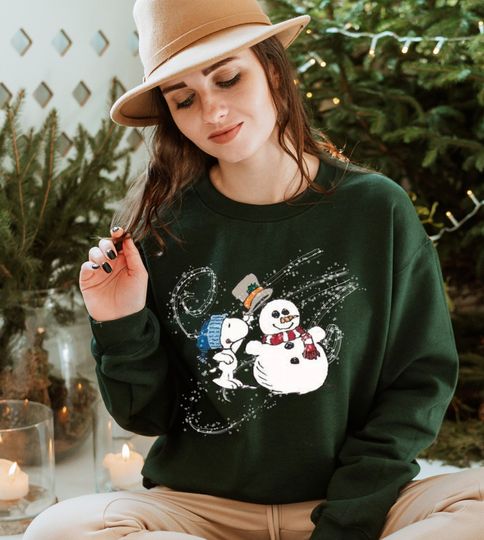 Discover vintage snoopy with snowmanwinter wonderland crewneck