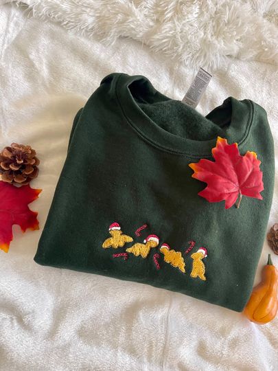 Discover Dino Nugget Embroidered Christmas Sweatshirt