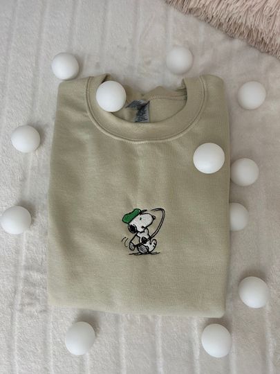 Discover Sand Snoopy Embroidered Unisex Pullover, Swinging Snoopy