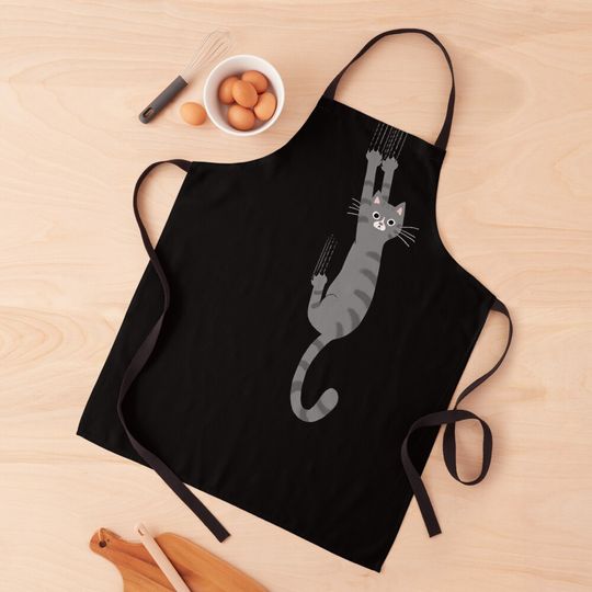 Discover Grey Tabby Cat Hanging On Apron
