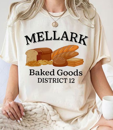 Discover Mellark Bakery T-Shirt Shirt, THG Series All Districts Welcome District 12 Tee