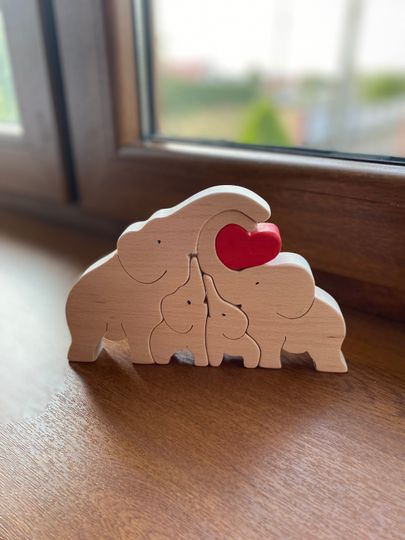 Discover Wooden elephants family, wooden animal family, elephants family puzzle