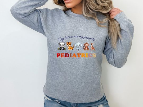 Discover Unisex "Tiny Heroes Are My Favorite Pediatrics" Sweatshirt