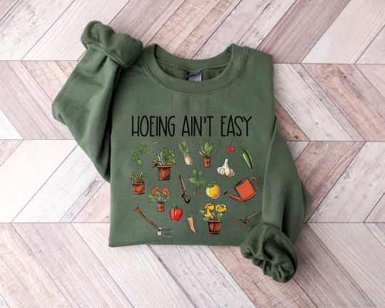 Discover Hoeing Ain't Easy Gardening Quote Sweatshirt