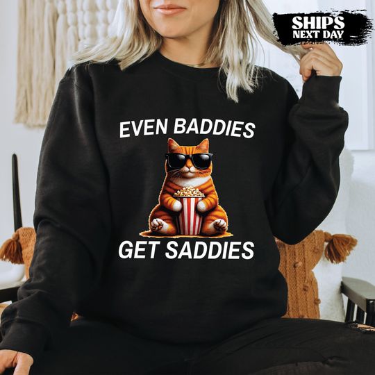 Discover Cat Meme Sweatshirt - Even Baddies Get Saddies Sweatshirt