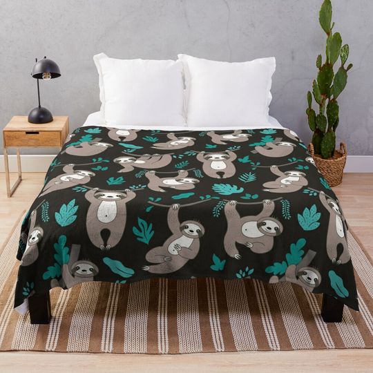 Discover Lazy Sloths on Black Background Throw Blanket