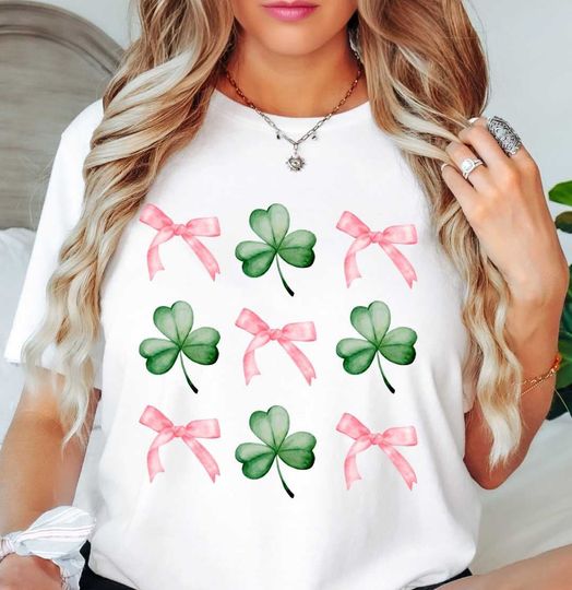 Discover Coquette Bow and Clovers (Tee) T-Shirt | St. Patty's Day Fashion | Unique Gifts for Family Friends
