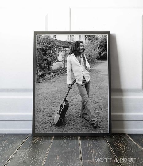 Discover Bob Marley Poster, Bob Marley With His Guitar At Hope Road 1976 Poster